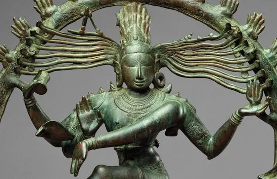 Round face, almond eyes and long arms of Shiva surrounded by circle of fire (detail), Shiva as Lord of the Dance (Nataraja), c. 11th century, Copper alloy, Chola period, 68.3 x 56.5 cm (The Metropolitan Museum of Art)