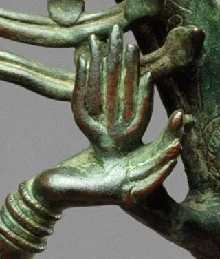 Shiva's upper left hand holding the agni, the flame of destruction (detail), Shiva as Lord of the Dance (Nataraja), c. 11th century, Copper alloy, Chola period, 68.3 x 56.5 cm (The Metropolitan Museum of Art)