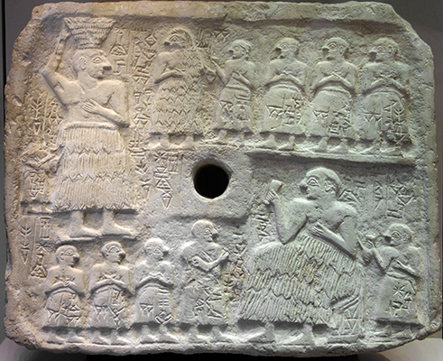 Perforated relief of Ur-Nanshe, king of Lagash, limestone, Early Third Dynasty (2550–2500 B.C.E.), found in Telloh or Tello (ancient city of Girsu). 15-¼ x 18-¼ inches / 39 x 46.5 cm (Musée du Louvre)