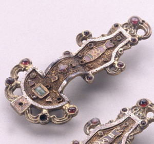 Merovingian (Frankish) Looped Fibulae, mid-6th century, silver gilt worked in filigree with inlaid garnet and other stones (Musée des Antiquities Nationales, Saint-Germain-en-Laye)