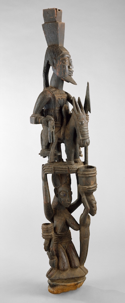 Olowe of Ise, Veranda post, before 1938 (Yoruba people, Nigeria), wood, pigment, 180.3 x 28.6 x 35.6 cm (The Metropolitan Museum of Art, New York City)