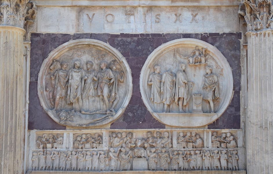 Reliefs from the South side of the Arch of Constantine, 312-315. Roundels date to the era of Hadrian, c. 117-138 C.E. and the frieze, Showing the distribution of Largesse dates to the time of Constantine, 312-315 C.E.