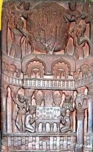 Detail of Englightenment face of Prasenajit pillar, from Bharhut, Madhya Pradesh, India. Sunga period, c. 100-80 BCE. Reddish brown sandstone. Indian Museum, Kolkata.
