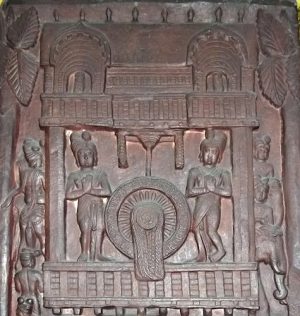 Wheel of Law on Prasenajit pillar, from Bharhut, Madhya Pradesh, India, Sunga period, c. 100-80 BCE. , reddish brown sandstone (Indian Museum, Kolkata)