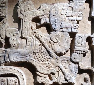 A figure emerges from the mouth of a vision serpent (detail), Structure 23, Lintel 25, Yaxchilán (Maya)