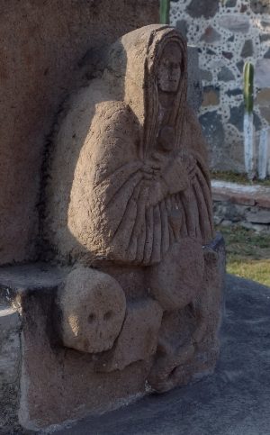 Virgin Mary and skull (detail), Atrial Cross, Acolman