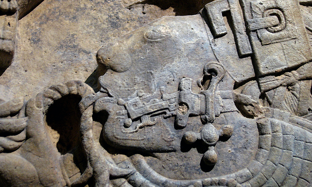 Lady K'abal Xook pulling a thorned rope through her tongue (detail), Yaxchilán lintel 24, after 709 C.E., Maya, Late Classic period, limestone, 109 x 78 x 6 cm, Mexico © Trustees of the British Museum