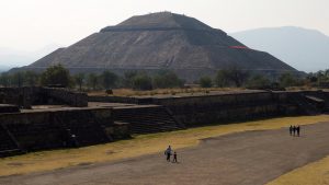 Teōtīhuacān reached its peak from the 1st to the mid-6th century C.E. The main structures include the Pyramids of the Sun and the Moon, Avenue of the Dead, and the Temple of Quetzalcoatl (feathered serpent). Teotihuacan was home to as many as 125,000 people. The name Teōtīhuacān was given by the Aztecs long after the city had been abandoned c. 550 C.E. The original name is lost.