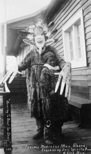 “Eskimo medicine man and sick boy” from the Library of Congress