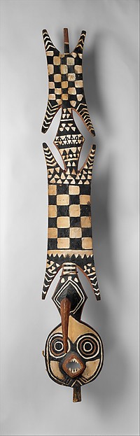 Mask (Nwantantay), Burkina Faso, Black Volta River region, Bwa peoples. 19th–20th century, wood, pigment, and fiber, 182.9 x 28.2 x 26 cm (The Metropolitan Museum of Art)