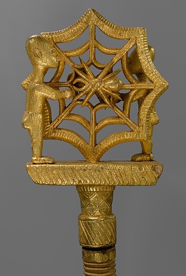 Head of staff (detail), Linguist Staff (Okyeame), 19th–early 20th century (Akan peoples, Asante, Ghana), gold foil, wood, nails, 156.5 x 14.6 x 5.7 cm (The Metropolitan Museum of Art, New York)