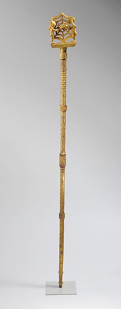 Staff of Office: Figures, spider web and spider motif (ȯkyeame), 19th–early 20th century, Ghana, Akan peoples, Asante, gold foil, wood, nails, 156.5 x 14.6 x 5.7 cm (The Metropolitan Museum of Art, New York)