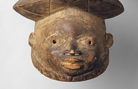 Helmet Mask (Gelede), 20th century, Nigeria or Republic of Benin, Yoruba people, Ketu group, wood, 57.2 x 38.7 x 45.7 cm (The Metropolitan Museum of Art)