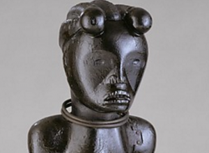 Figure from a Reliquary Ensemble: Seated Female, 19th–early 20th century, Fang peoples, Okak group, Gabon or Equatorial Guinea, wood, metal, 64 x 20 x 16.5 cm (The Metropolitan Museum of Art)