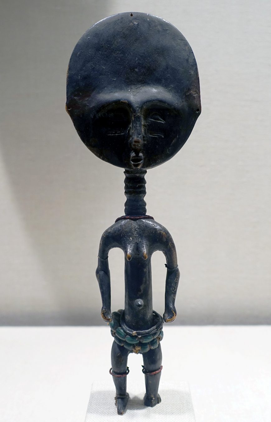 Akua’ba, 19th-20th century, (Asante people) Ghana, wood, beads, string, 27.2 x 9.7 x 3.9 cm (The Metropolitan Museum of Art)