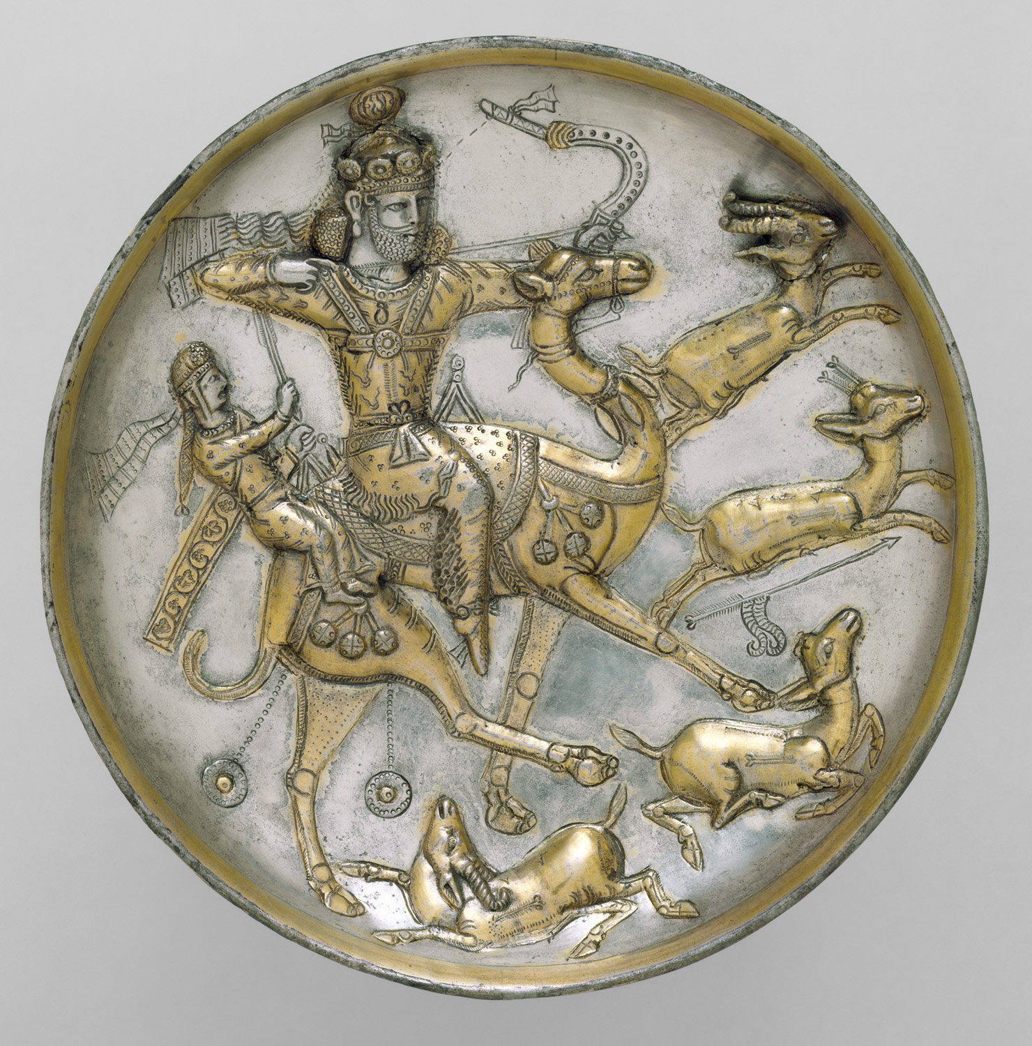Plate with a hunting scene from the tale of Bahram Gur and Azadeh, c. 5th century, Sasanian, silver, mercury gilding, 4.11 cm high and 20.1 cm diameter (The Metropolitan Museum of Art, New York)