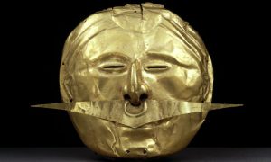 Mask with Nose Ornament, c. 500 B.C.E.–1600 C.E., gold alloy, 15.5 x 18 cm, Quimbaya © The Trustees of the British Museum. This spectacular hammered mask with a dangling nose ornament would probably have been placed on top of the face of a funerary bundle – the wrapped body of the deceased—transforming him into an ancestor and semi-divine figure.