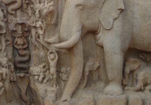Elephant with calves, cat standing on one leg (bottom left), and half human-half snake figures slithering up the crevice, Descent of the Ganges or Arjuna’s Penance, 7-8th C., Mahabalipuram, Tamil Nadu, India