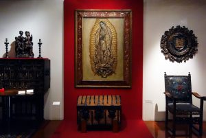 Virgin of Guadalupe, late 17th century, 190 cm high, oil paint, gilding, and mother of pearl on panel (Franz Mayer Museum, Mexico City)