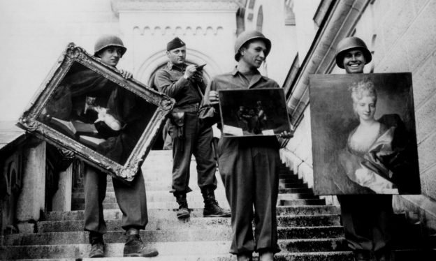 James Rorimer with soldiers, paintings at Neuschwanstein
