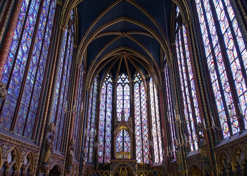 The interior of the chapel is filled with rainbow colored stained glass windows. Sainte-Chapelle, Île de la Cité, Paris, 1248