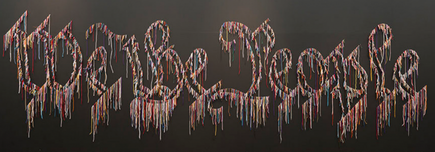 Nari Ward, We the People (black version), 2015, shoelaces, 8 × 27 feet (Crystal Bridges Museum of American Art, Bentonville, Arkansas)
