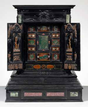 Display cabinet from Augsburg, Germany, c. 1630, ebony and other woods, porphyry, gemstones, marble, pewter, ivory, bone, tortoiseshell, enamel, mirror glass, brass, and painted stone, 73 x 57.9 x 59.1 cm (The J. Paul Getty Museum)