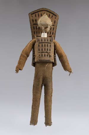 Coconut fiber cuirass with struts, decorated with human hair, with porcupine fish helmet (photo: Josh Murfitt, Museum of Archaeology and Anthropology, University of Cambridge)