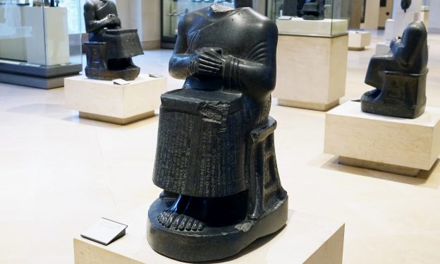 Seated Gudea holding temple plan