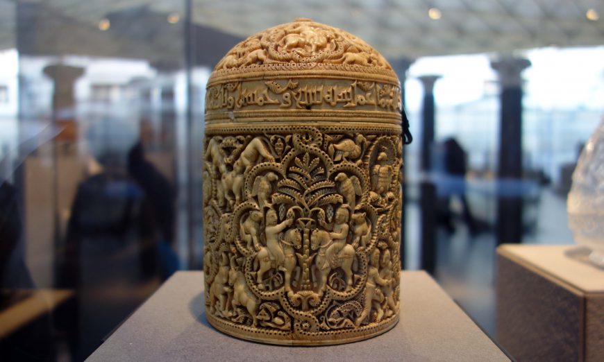 Pyxis of al-Mughira, possibly from Madinat al-Zahra, AH 357/ 968 CE, carved ivory with traces of jade, 16cm x 11.8 cm (Musée du Louvre, Paris) (photo: Steven Zucker, CC BY-NC-SA 2.0)