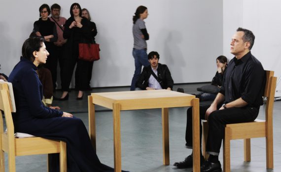 Marina Abramović sitting with Rebecca Taylor at The Artist is Present performance at The Museum of Modern Art, 2010