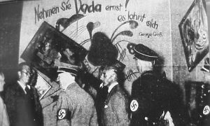 Adolf Hitler and Adolf Ziegler inspect the installation by Willrich and Hansen of the Degenerate Art exhibition in Munich, 1937