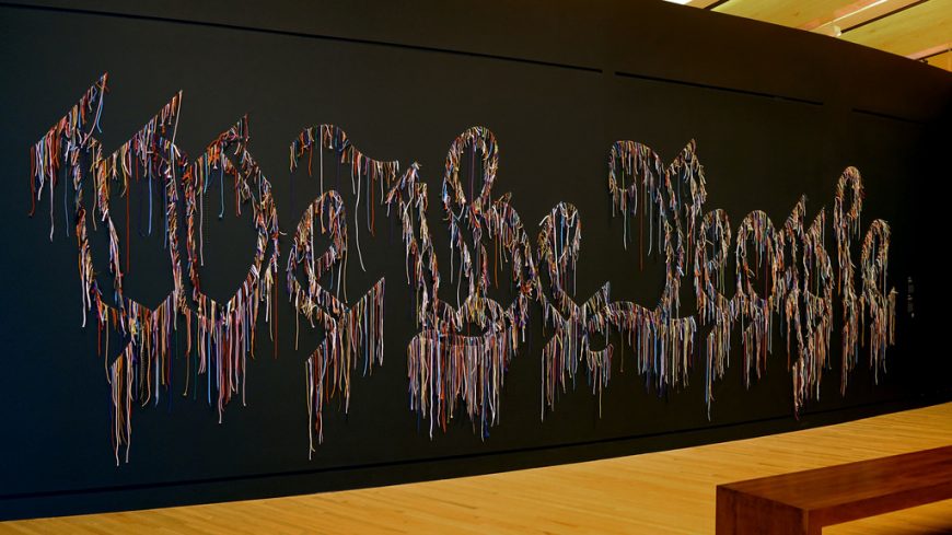 Nari Ward, We the People (black version), 2015, shoelaces, 8 × 27 feet (Crystal Bridges Museum of American Art, Bentonville, Arkansas)