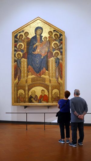 View of Cimabue's Maestà with viewers.