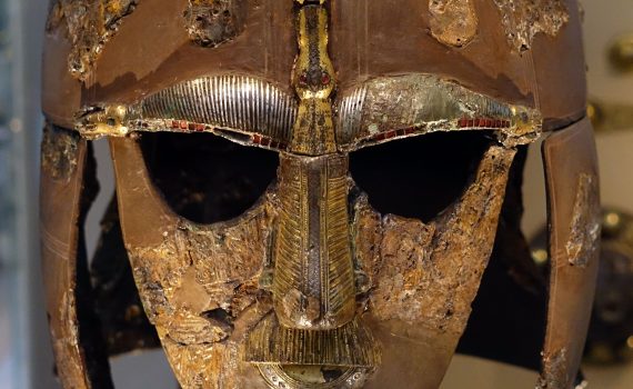 Sutton Hoo ship-burial helmet, iron, copper alloy, gold, tin, garnet, and silver, c. 600-650 C.E., 31.8 x 21.5 x 25.5 (The British Museum)
