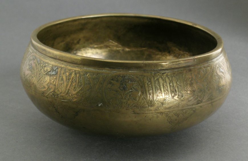 Bowl, Syria, 14th century, brass, incised and engraved, with traces of silver inlay, 7.62 x 16.51 cm (LACMA)