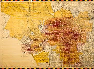 A map of Los Angeles marked with large red "RAPE" stamps to indicate places where rapes had occurred. Created by Suzanne Lacy for Three Weeks in May, an activist performance art work that took place from May 8 to May 24, 1977.