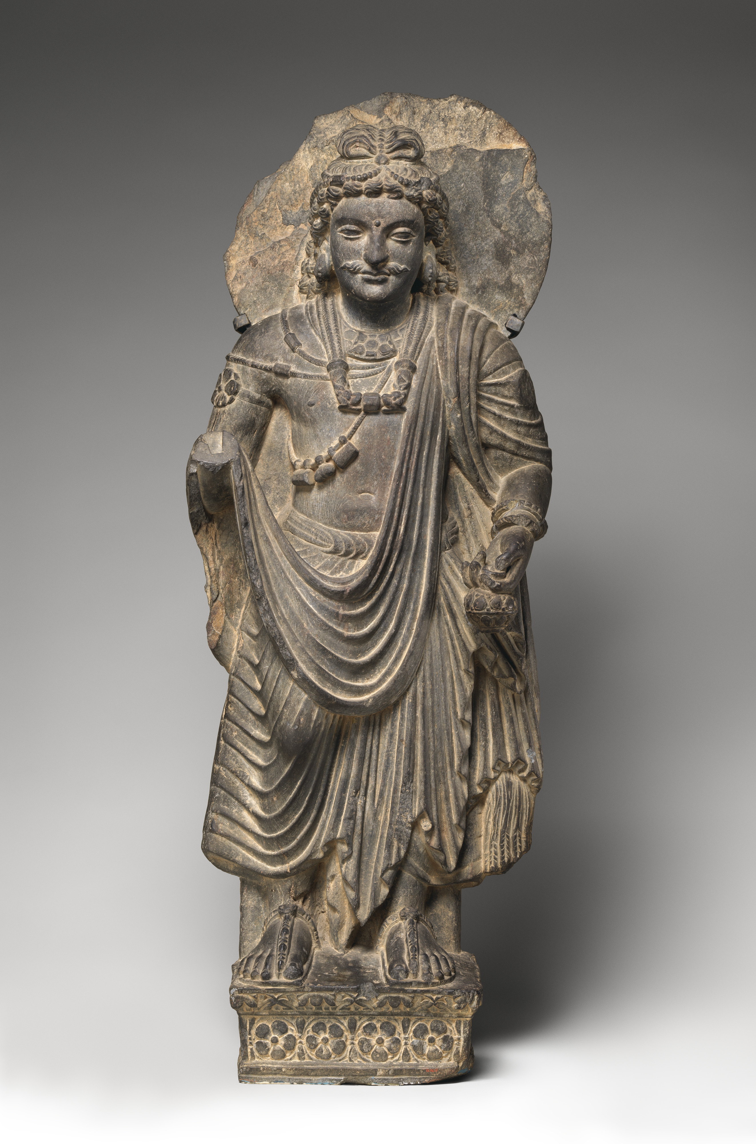 Standing Bodhisattva Maitreya (Buddha of the Future), c. 3rd century, Pakistan (ancient region of Gandhara), schist, 80.7 cm high (The Metropolitan Museum of Art)