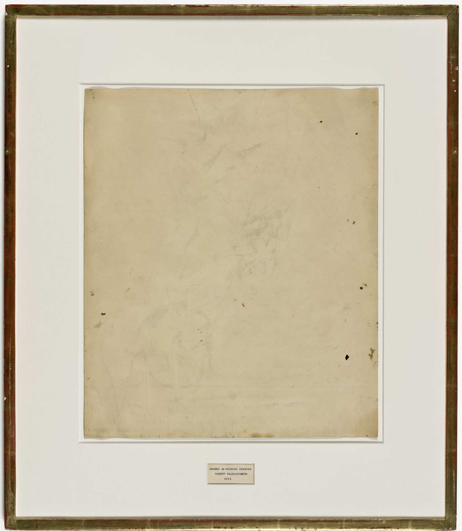 Robert Rauschenberg, Erased de Kooning Drawing, 1953, traces of drawing media on paper with label and gilded frame, 25 1/4 in. x 21 3/4 in. (64.14 cm x 55.25 cm) (© Robert Rauschenberg Foundation, image: SFMOMA) 