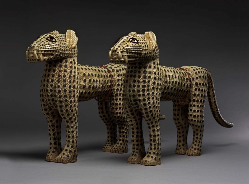 Pair of leopards, made of ivory with metal inlay. Edo people, Benin, 19th century. © Her Majesty Queen Elizabeth II, 2017.