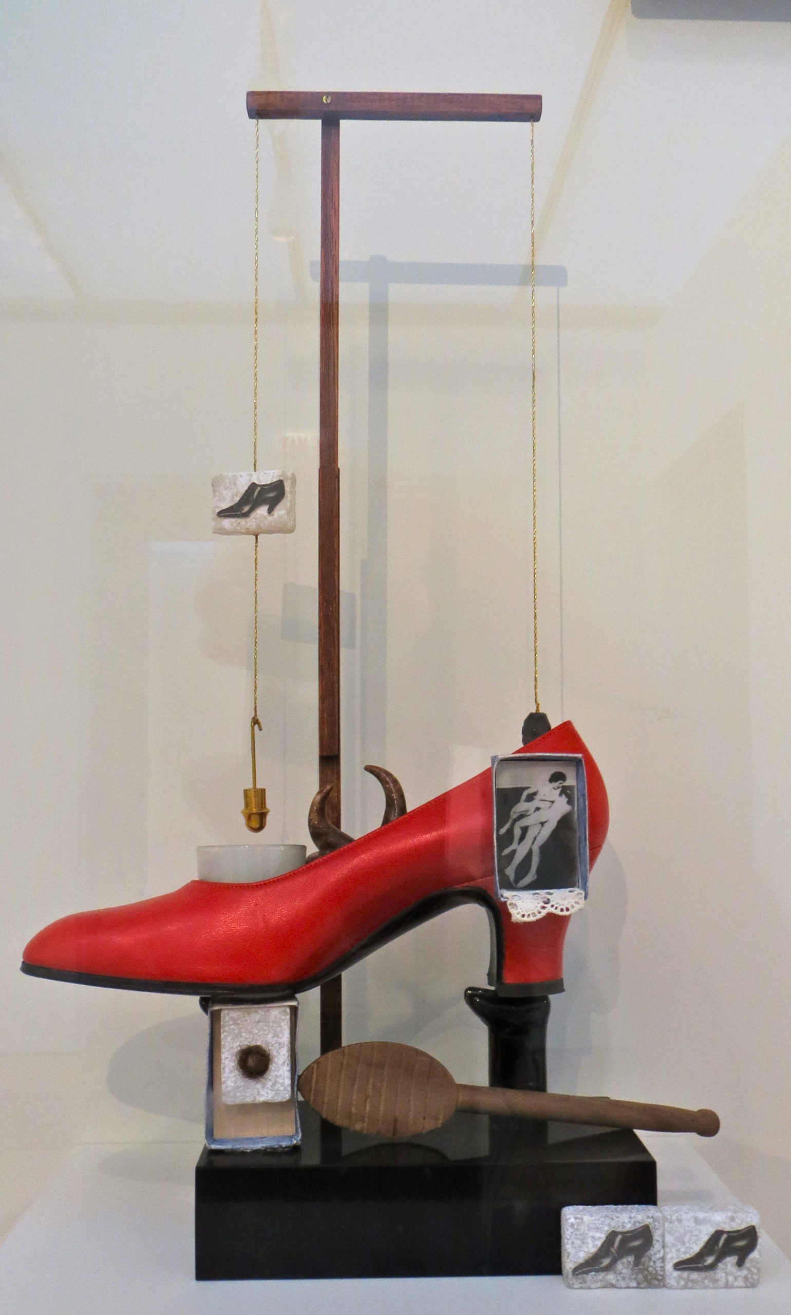 Salvador Dalí, Surrealist Object Functioning Symbolically — Gala’s Shoe, 1931 (1973 edition), Assemblage with shoe, marble, photographs, glass, was, hair, scraper, and gibbet. 48.3 x 27.9 x 9.4 cm (The Dalí Museum, St. Petersburg, FL; photo: ellenm1, CC BY-NC 2.0)