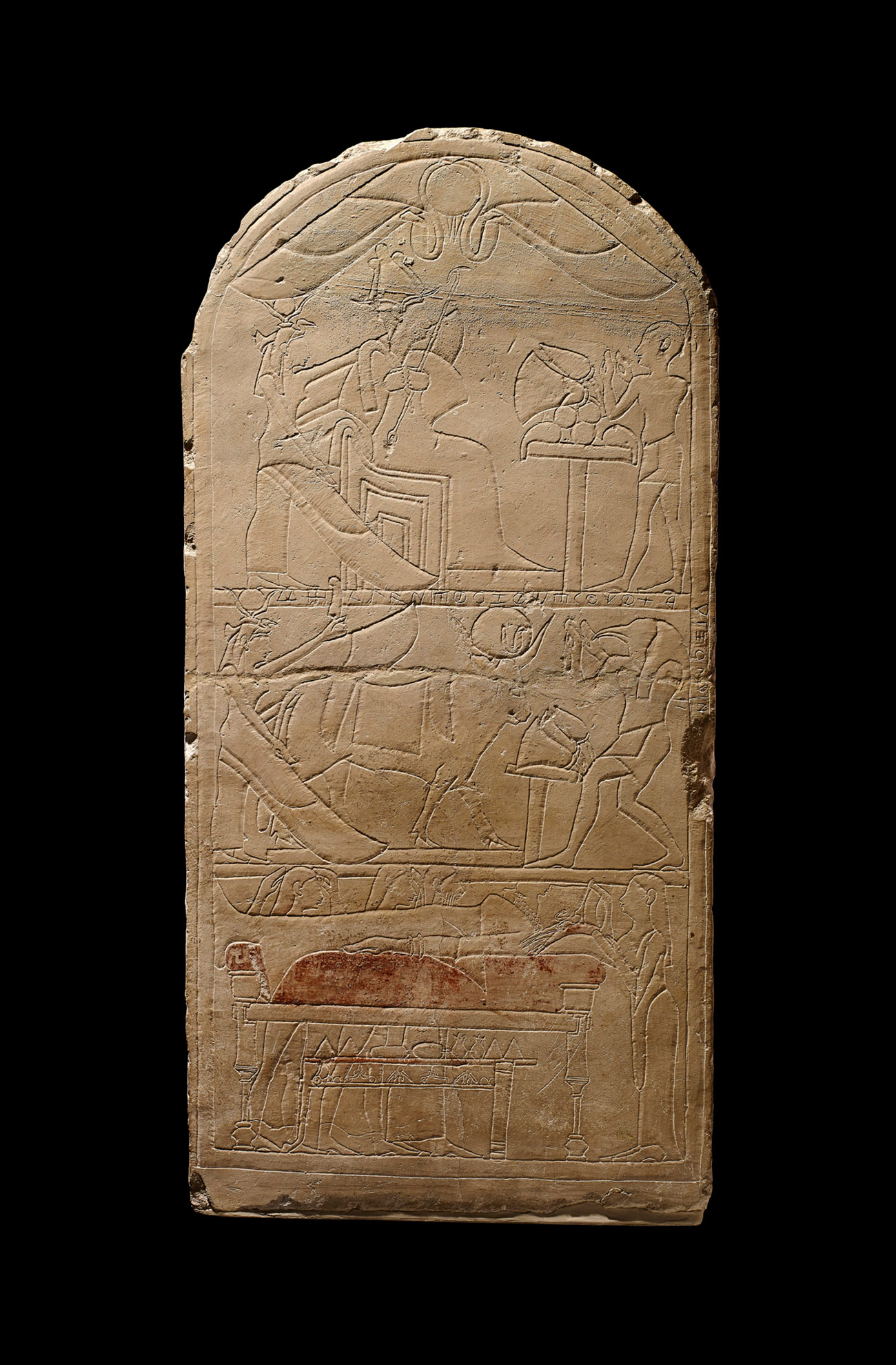 Funerary Stela with a Carian Inscription, 500s B.C., Egyptian. Limestone, 24 3/4 × 12 1/4 × 4 in. On loan from the Trustees of the British Museum, donated by Egypt Exploration Society, 1971. © The Trustees of the British Museum. Featured in the exhibition Beyond the Nile: Egypt and the Classical World