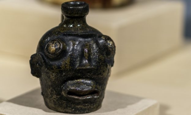 Face Jug  from Edgefield county, South Carolina, c. 1860, stoneware and alkaline glaze, 13.3 cm high (The Art Institute of Chicago 2006.84)
