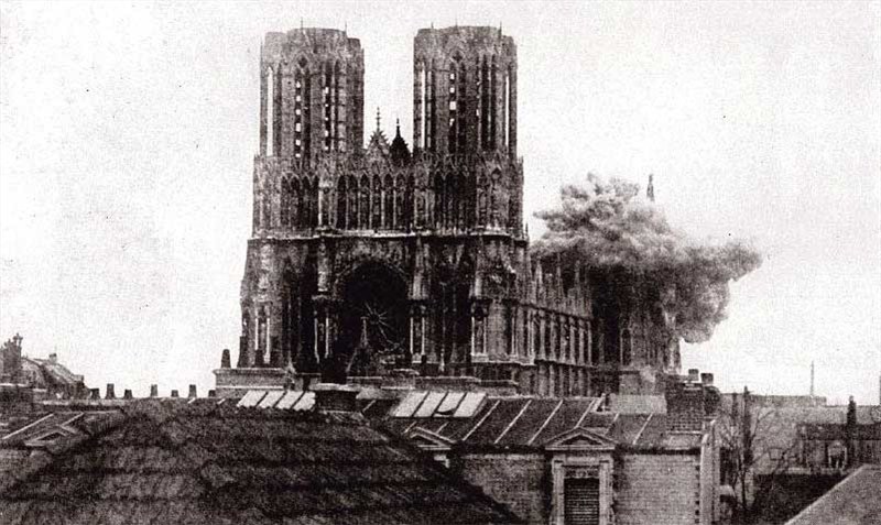 Shell bursting on the cathedral at Rheims (photo: Collier's New Photographic History of the World's War, 1918) 