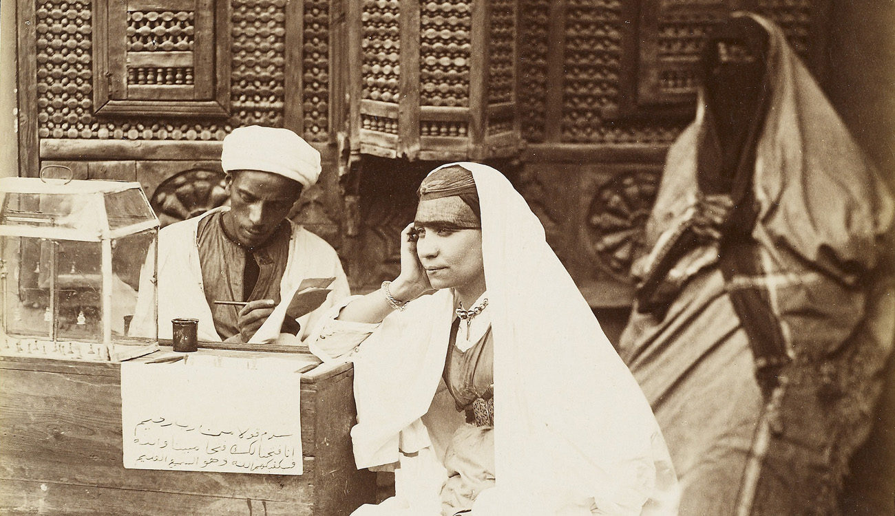 Ecrivain public (public scribe), detail, about 1872, Otto Schoefft. Unmounted albumen print, 24.7 x 19.5 cm. The Getty Research Institute, 2008.R.3. Ken and Jenny Jacobson Orientalist Photography Collection