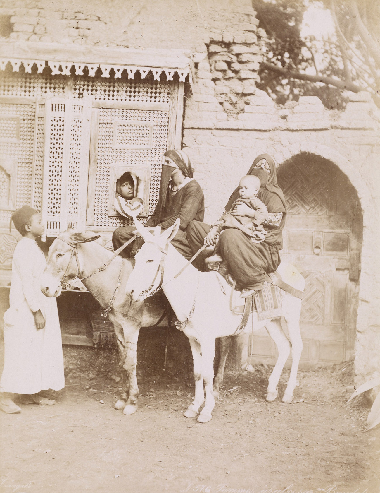 Femmes arabes sur Baudet (Arabic women on donkeys), about 1875, Zangaki Brothers. Unmounted albumen print, 20.5 x 27.7 cm. The Getty Research Institute, 2008.R.3. Ken and Jenny Jacobson Orientalist Photography Collection