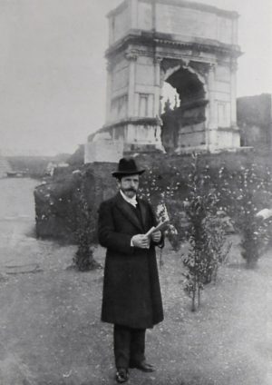 The Italian archaeologist Giacomo Boni (1859-1925) in the Roman Forum in front of the Arch of Titus, Rome, Italy, from L'Illustrazione Italiana, Year XXXIV, No 7, February 17, 1907.