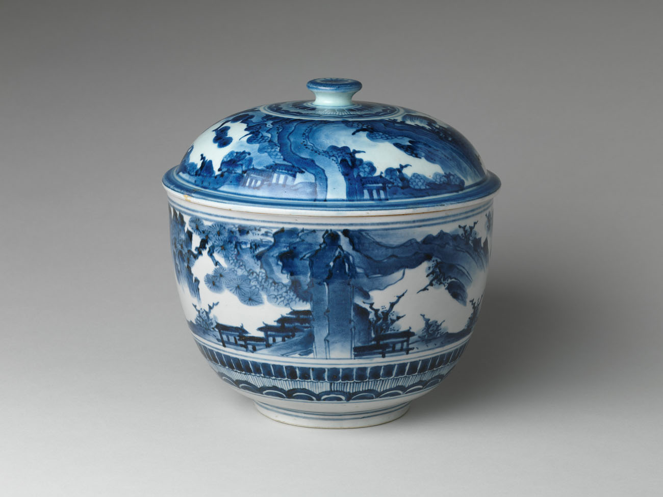 A similar work of Japanese porcelain at the Metropolitan Museum of Art. It shows how the bowls at the Getty would have appeared when they were made, before being shipped to Europe. Tureen with Landscape, late 1600s, Japanese. Diameter 10 inches. The Metropolitan Museum of Art, 2002.447.47a,b. Bequest of Dr. and Mrs. Roger G. Gerry, 2000. 