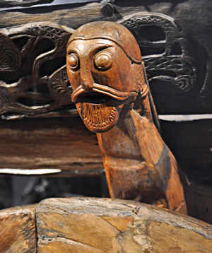 Bearded man, detail on the cart, before 800, wood, found in the Oseberg burial mound (Museum of Cultural History, photo: Helen Simonsson, CC BY-SA 4.0)