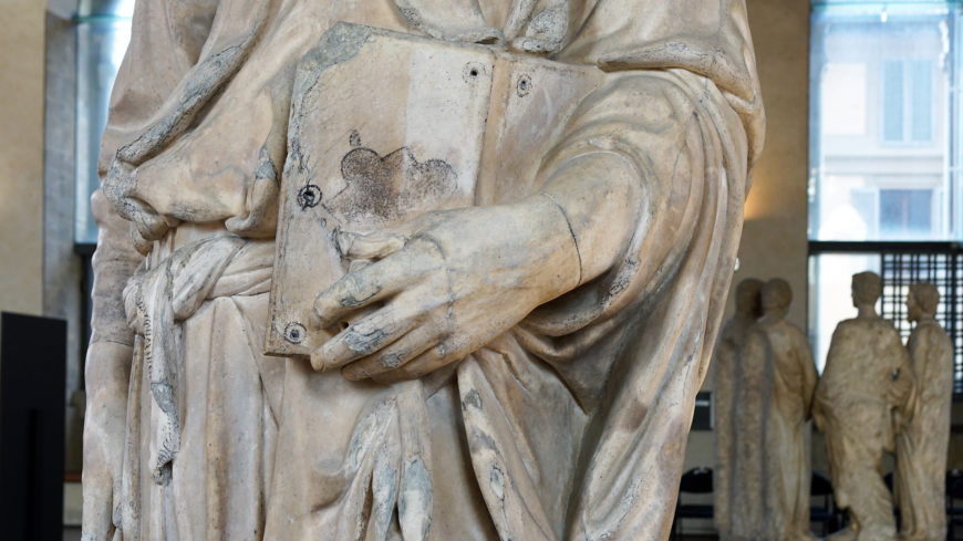 Hand and book (detail), Donatello, Saint Mark, 1411-13, marble, 93″ (236 cm) Orsanmichele, Florence (photo: Steven Zucker, CC BY-NC-SA 2.0)